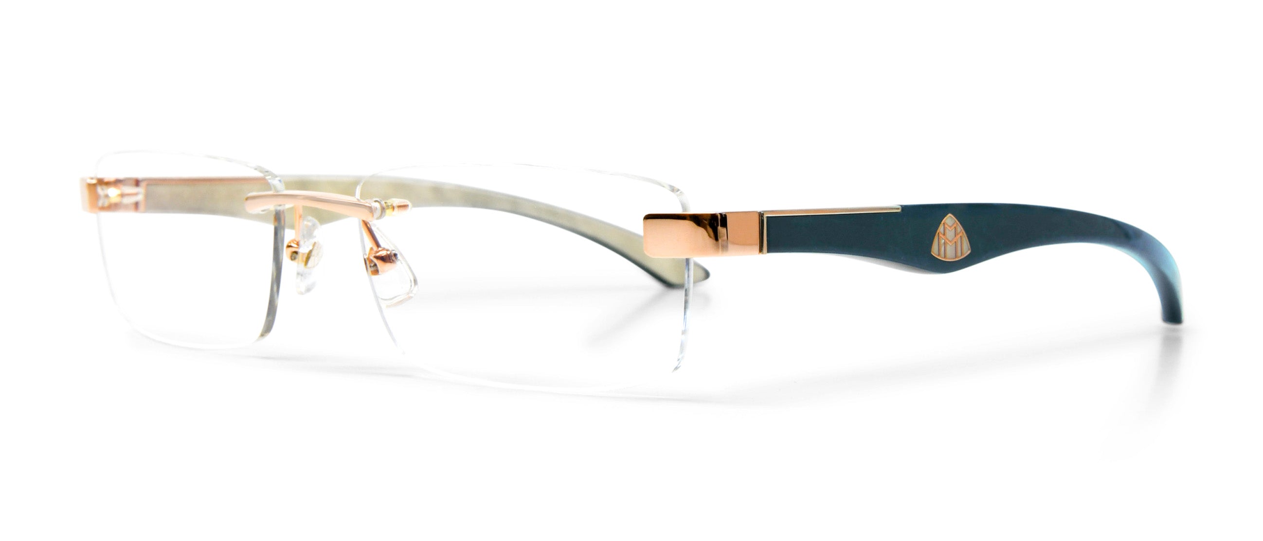 Side view of Maybach in #color_Rose Gold / Deep Teal Ocean Madrone