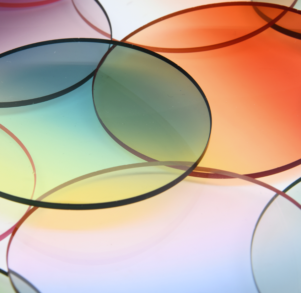 An array of colored circle lenses lay overlapped