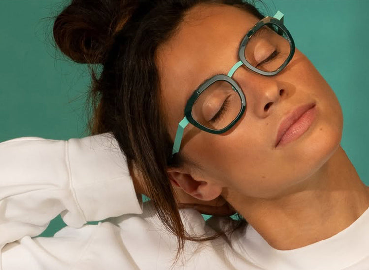 Female model wearing Anne et Valentin eyeglasses