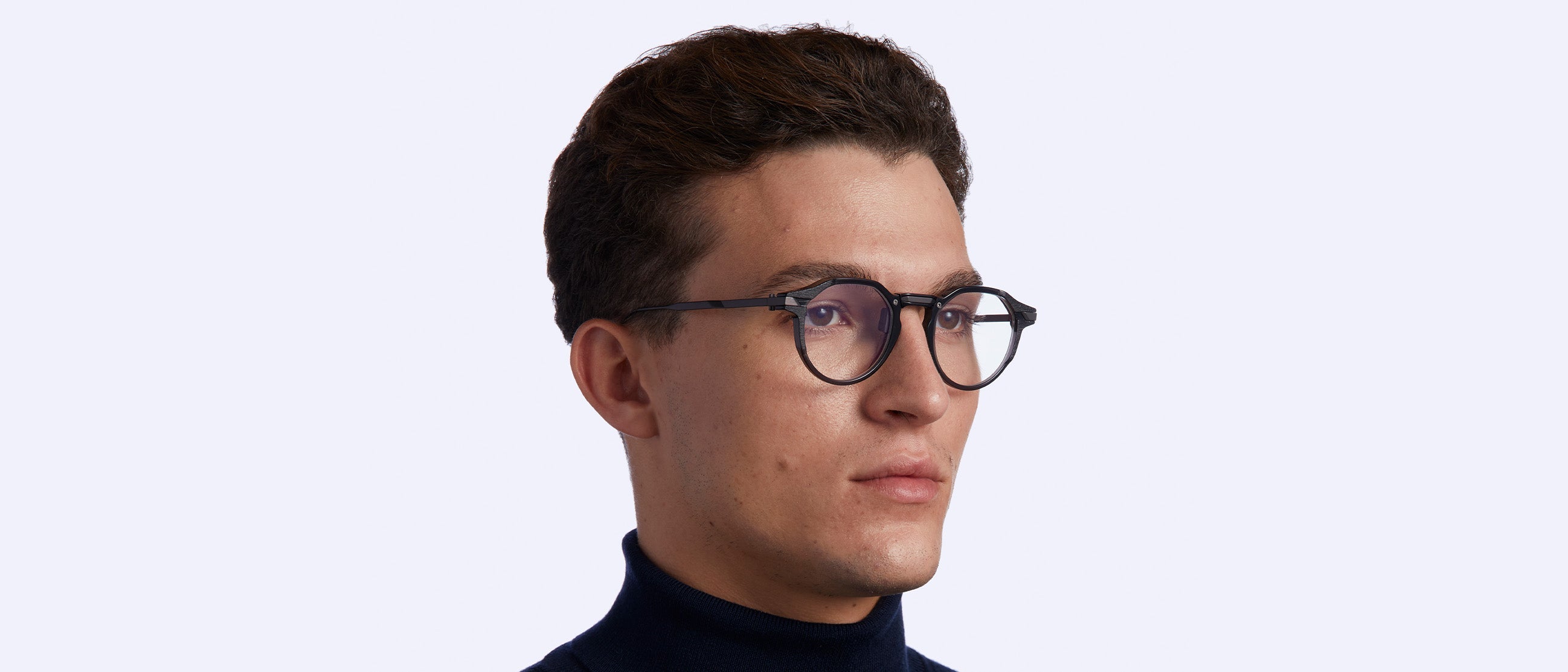 Male model wearing AM 03 Eyeglasses from Movitra