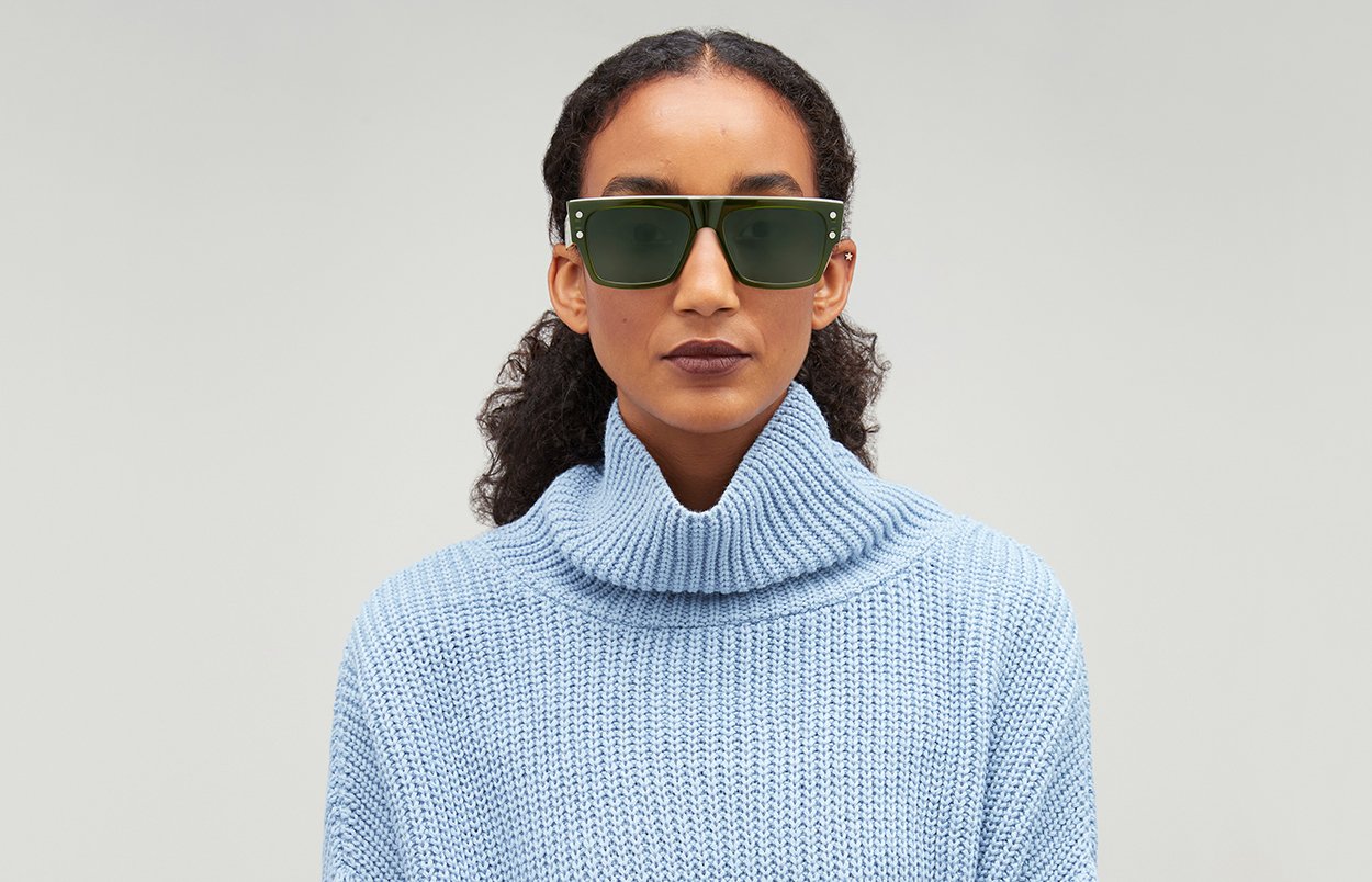 Front view of female model wearing B-III sunglasses
